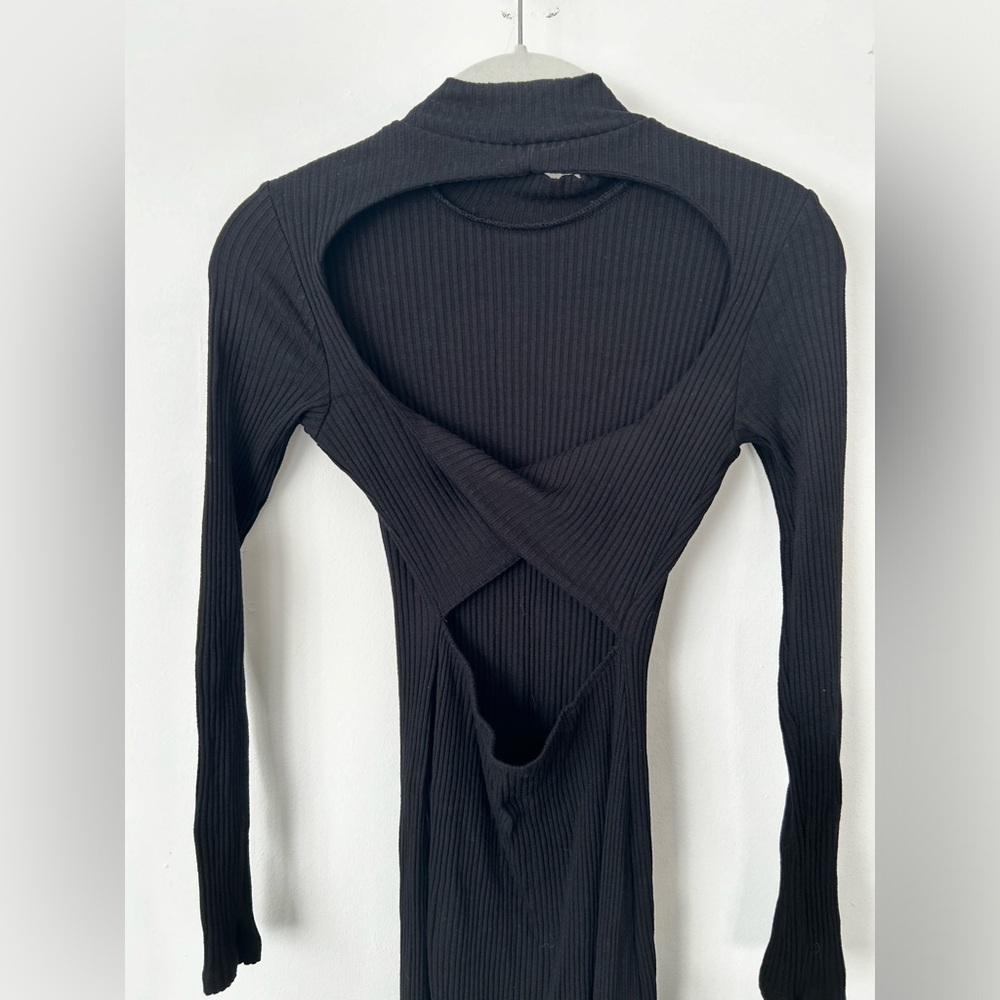 H&M black ribbed mock neck midi dress with open twist back. Size XS.